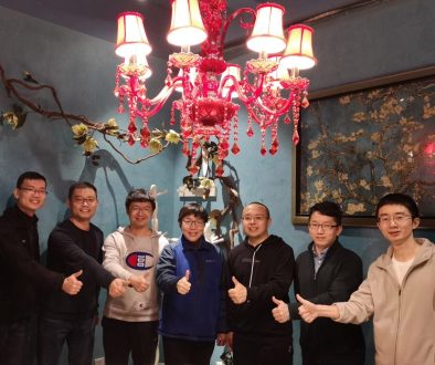 A group of people with their thumbs up